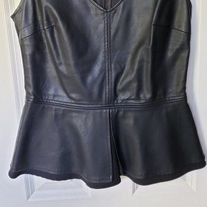 Adorable, yet sexy leather peplum tank from Zara